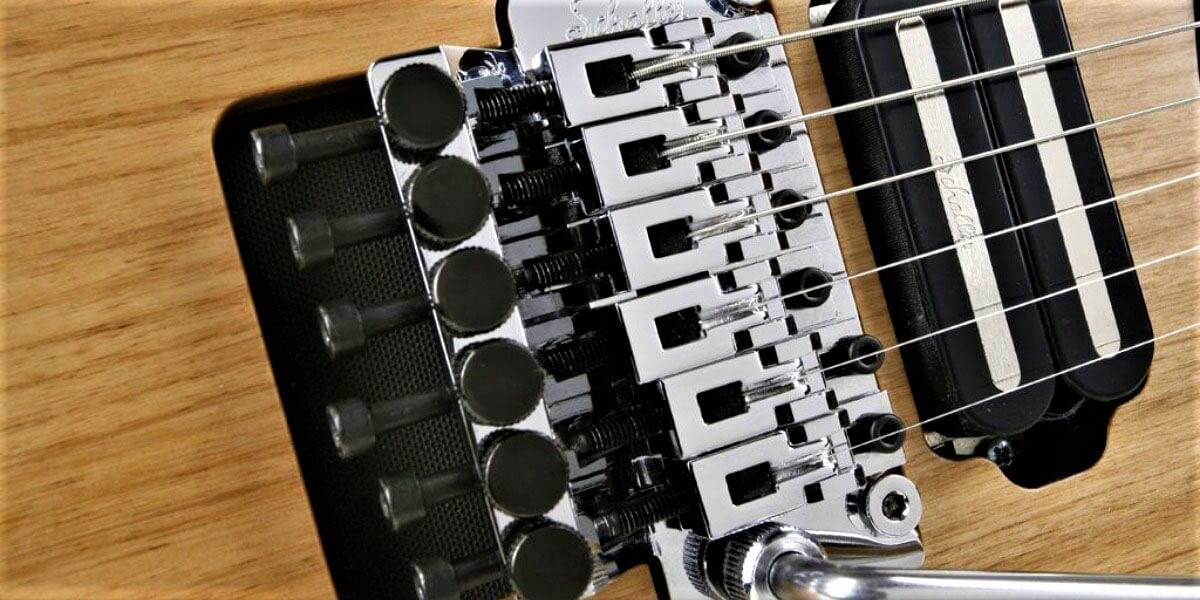 floating guitar bridge